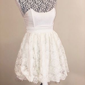 Structured, lace off white dress.